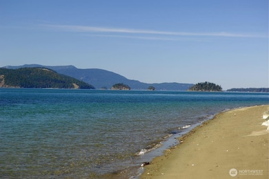 Shared beach access using stairs.    One of two beach access points.  Cypress Island     campgrounds just across the channel.