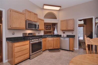 The Kitchen layout affords plenty of work space.