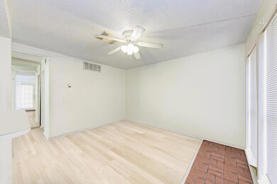 Unfurnished bedroom featuring a textured ceiling 