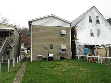 Exterior Front. Fenced in back yard