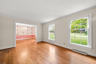 Large paned windows create a light, bright feel