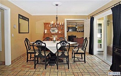 VIEW OF FORMAL DINING ROOM FROM LIVING ROOM LOOKIN