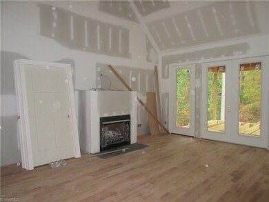 Living room which leads out to a covered back porc