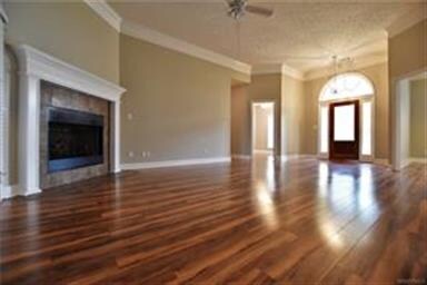 THE ENTRY WAY OPENS TO THE LIVING ROOM.  NOTICE TH