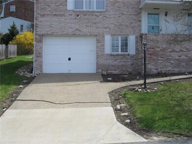 DRIVEWAY TO A DEEP INTEGRAL GARAGE.