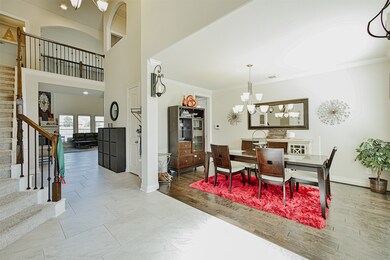 Formal dining room with hardwood floors located off the two story entry.
