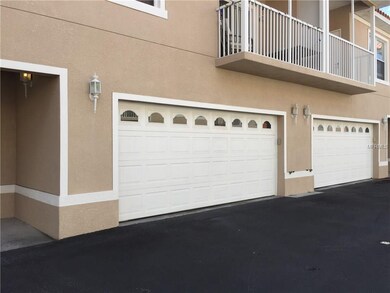 Large garage door on left opens to the large 596 s