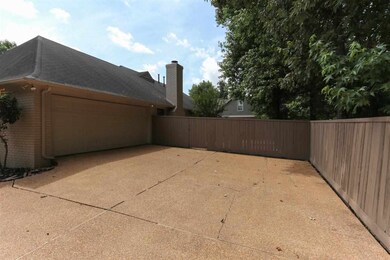 Long driveway leads to a back load garage! lots of