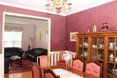 Hardwoods adorn the formal dining area as well!