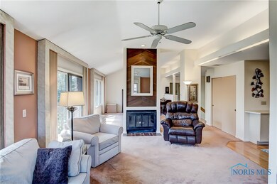 Family room w/woodburning fireplace