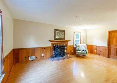 Family room with wood burning Fireplace, laminate 