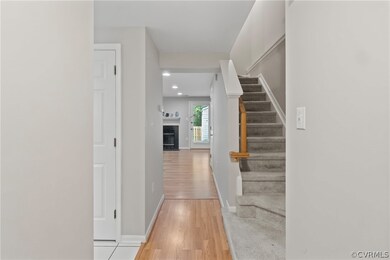 Corridor featuring light hardwood / wood-style flo