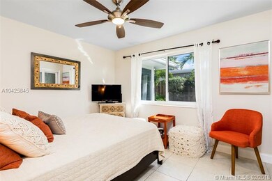 Natural light abounds this inviting guest room