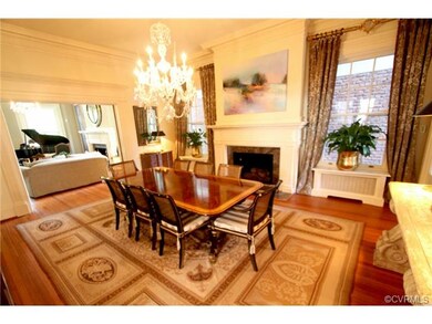 SIMPLY  THE BEST IN FORMAL DINING WITHA MARBLE SURROUND GAS FIREPLACE, FRENCH DOORS TO TERRACE AND MULTIPLE MEMBER CROWN MOLDING