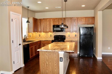 View of kitchen from dining nook