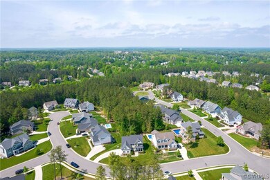 Wow look at those trees! Backs to woods and can't be built behind!