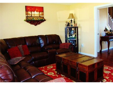 Living room offers laminate flooring.
