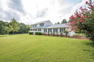 View of front of property featuring a front lawn