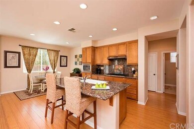 The flooring, the granite, the extra tall backspla