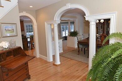 Handsome Doric columns frame the foyer