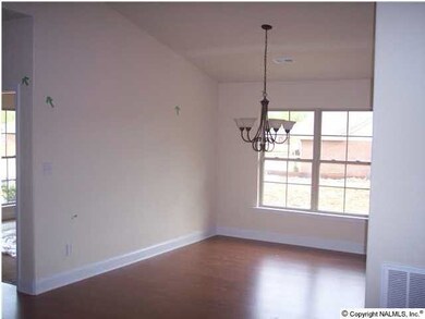 Dining area. Indirect lighting and beautiful light fixtures throughout.