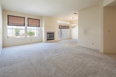 Living Room with fireplace, open floor plan and lo
