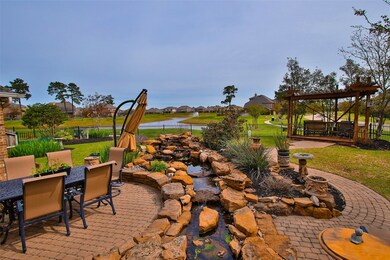 What a VIEW!  Large Yard with Koi Pond + Gorgeous Views of the Lake.