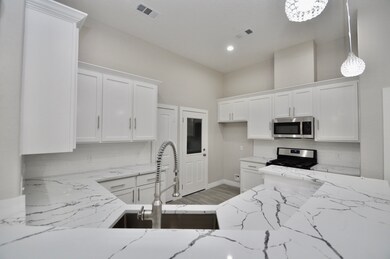 977 Lucky St, Houston, TX 77088 - photo 2