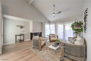 Living room featuring light wood-type flooring, a