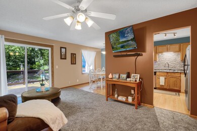Upstairs you will find a large living room which opens onto the deck & the dining area.