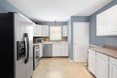 Wonderful space for meal preparation., great storage,  door leads to lower level