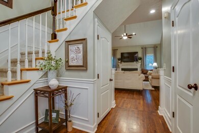 Look at this stunning foyer with custom trim 