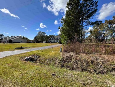 other side of property line to the left of lot