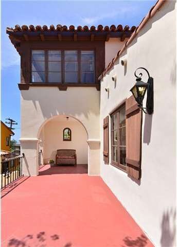 Arches, tiled roof, stained glass and iron work ar