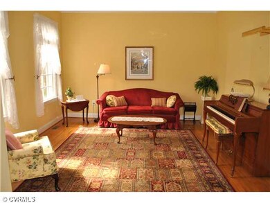 Living Room - The formal living room also has hard