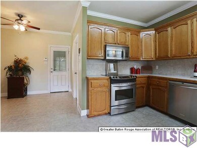 Kitchen Offers Updated Stainless Appliances, Stain