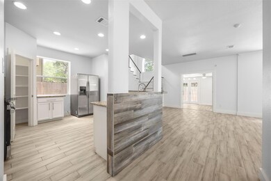 Living room featuring light wood-type flooring, s