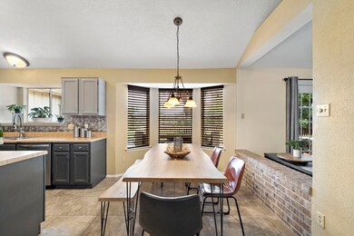 Breakfast area natural lighting invites comforting morning gathering