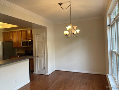 Formal Dining room with decorative light fixtures,