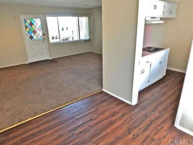 From dining room, looking to kitchen and living ro
