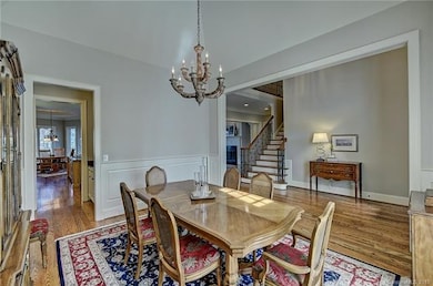 Dining Room--looking into foyer, wet bar and kitch