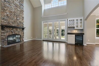 2 story great room that leads to 3 season porch