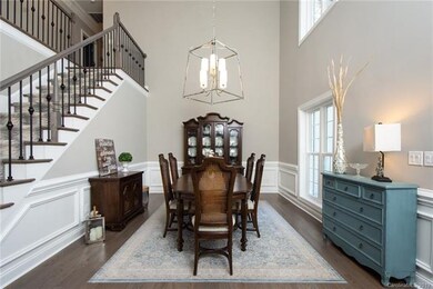 2 story formal dining with exquisite architectural