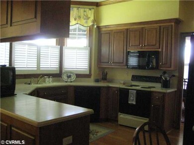Kitchen - Corian countertops, bright work area, do