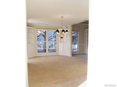 Dining Room view with Built-in Corner Cabinets and