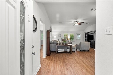 Foyer as you enter the home with the living room i