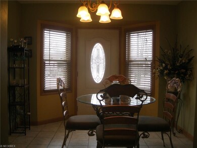 Dining area adjacent to kitchen. Bayed window area
