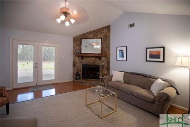 Living Room, field stone wood-burning fireplace