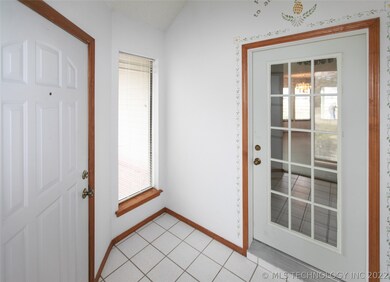 Entrance/atrium with French door.