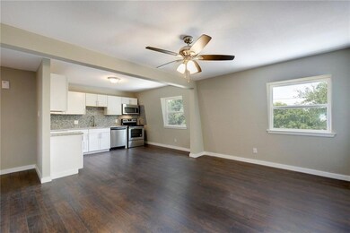Kitchen with stainless steel appliances, light co